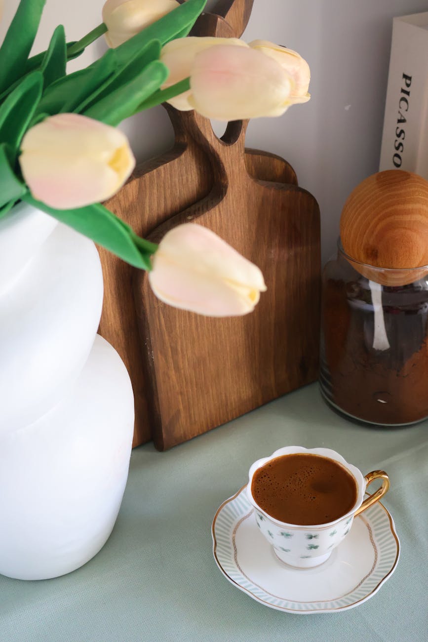 elegant coffee setting with tulips and cutting boards