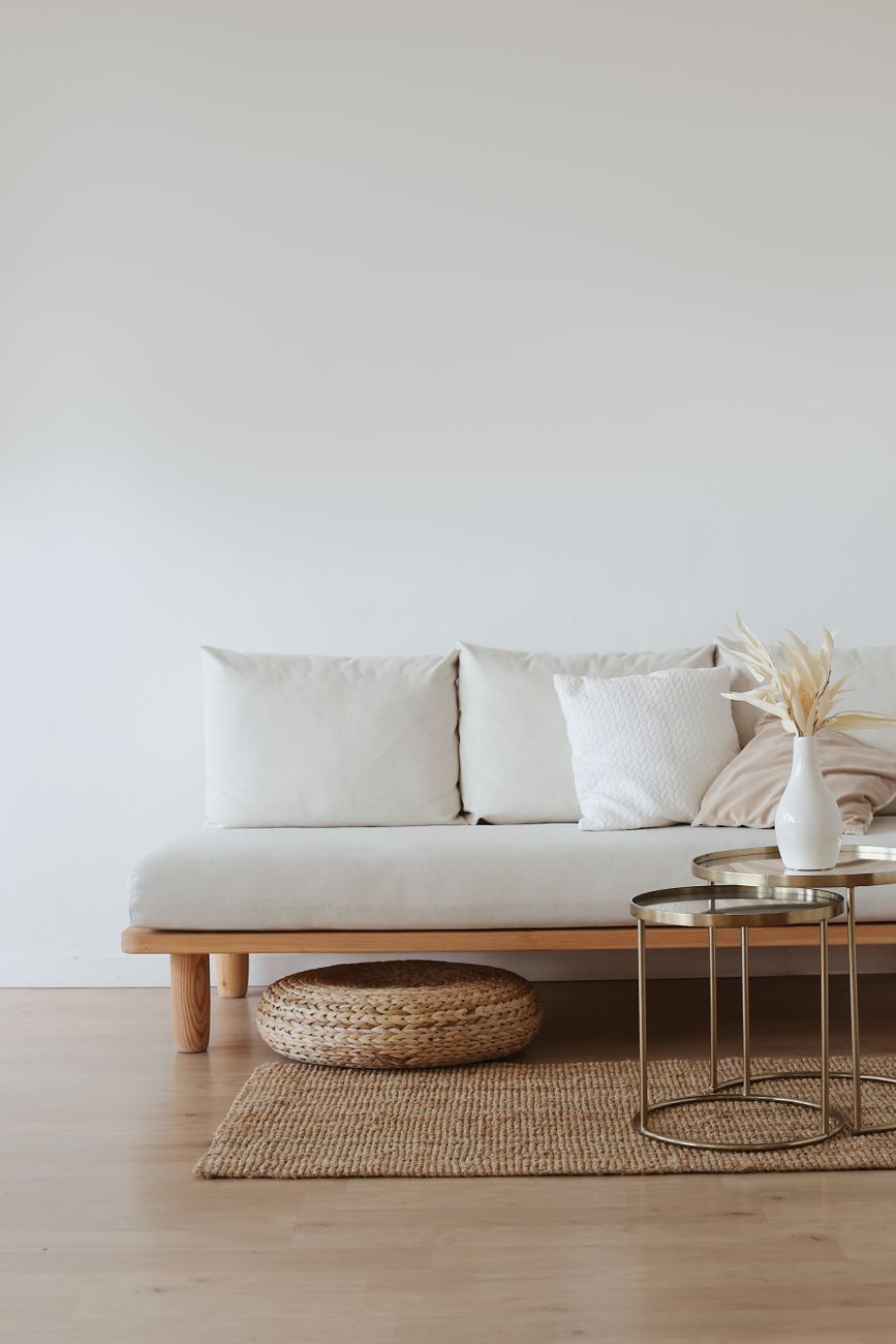 white couch on wooden floor